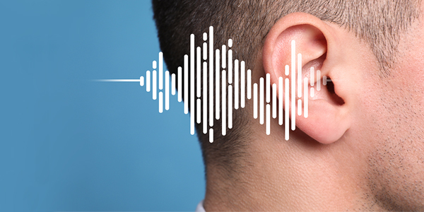 Ohr mit Hörwellen-Grafik